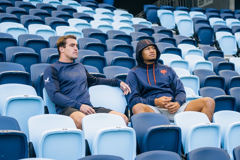 Looking to 2023: Connor Watson (left) and Sitili Tupouniua (right) look on at Allianz Stadium in anticipation with the 2023 NRL season just around the corner.
