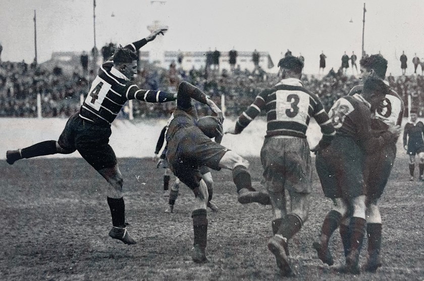 Tough Competitor: Sid 'Joe' Pearce (pictured left, number 4) leaps to take down South Sydney's George Treweeke. The two were strong competitors for their respective clubs through the 1920s and 1930s. 