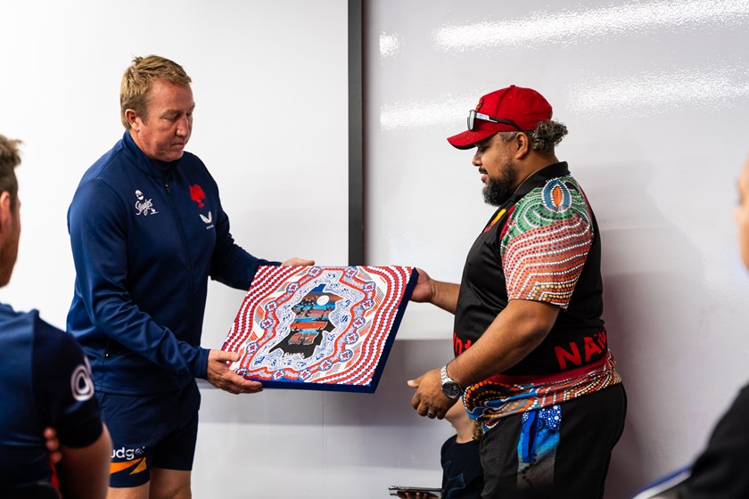 Final Product: Trent Robinson and Jason Ridgeway present the original design that is now on the 2021 Indigenous Jersey.