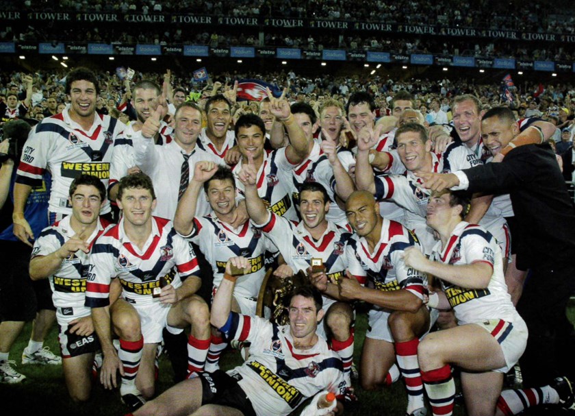 Bringing it Home: The 2002 Sydney Roosters, led by Brad Fittler (front), broke a 27-year-long drought to bring the Premiership trophy back to Bondi.