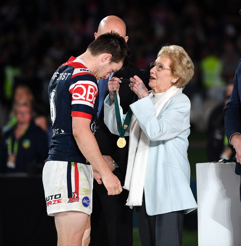 Man of the Match: Luke Keary is bestowed with the medal by Clive Churchill's wife, Joyce. 