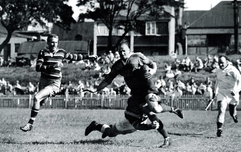 Temporary Home: Easts unexpectedly hosted a few matches at Redfern Oval in the mid-20th century. Shown here in 1956, lock Barry Blundell takes Kevin Turner into touch with a textbook cover tackle. 
