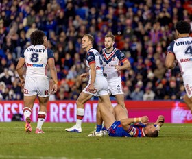 Friday night footy: Roosters deny Knights