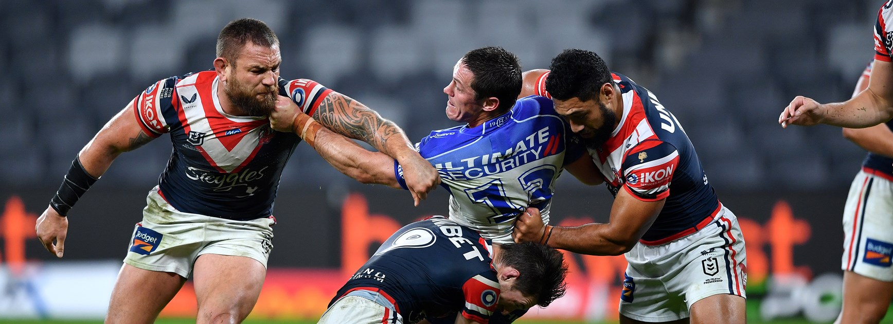Roosters Hold Off Dogs in Old-Fashioned Scrap