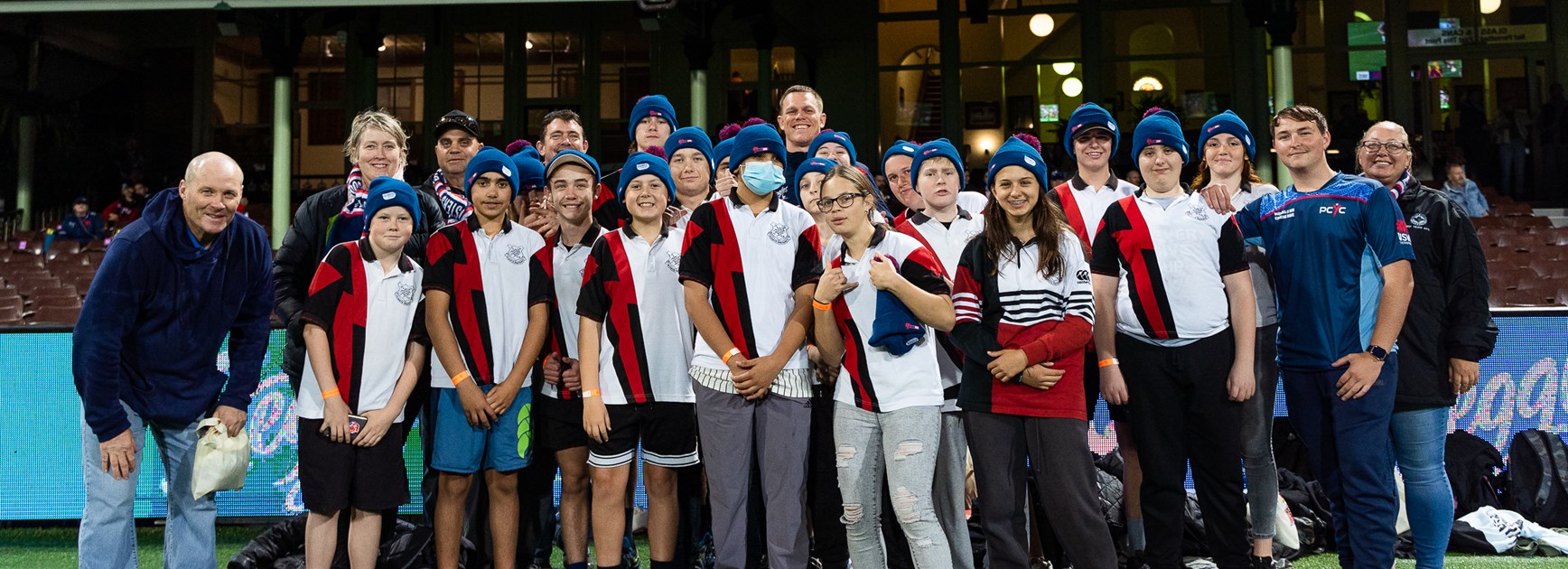 From Bush to Posts: Roosters Helping Dreams Come True for Young Students