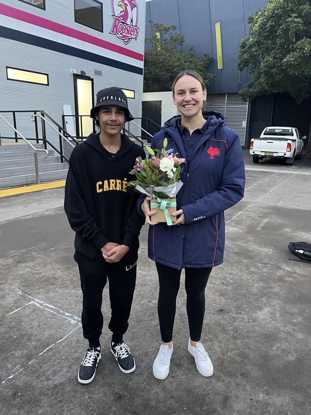 From Lightning Ridge to Moore Park: Quintin Bolton from Lightning Ridge Central School and Roosters Community Manager Claire Reed prior to the match - which proved to be a memorable experience for rural students alike. 