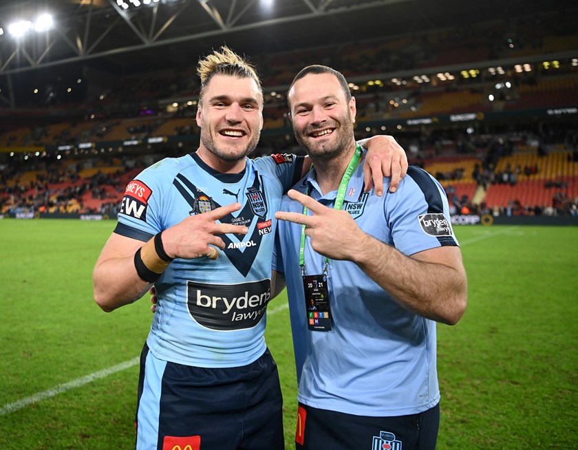 Passing on the Torch: Roosters Back Rowers Angus Crichton and Boyd Cordner celebrate the State of Origin Game II victory, which sealed the 2021 series for the Blues. 
