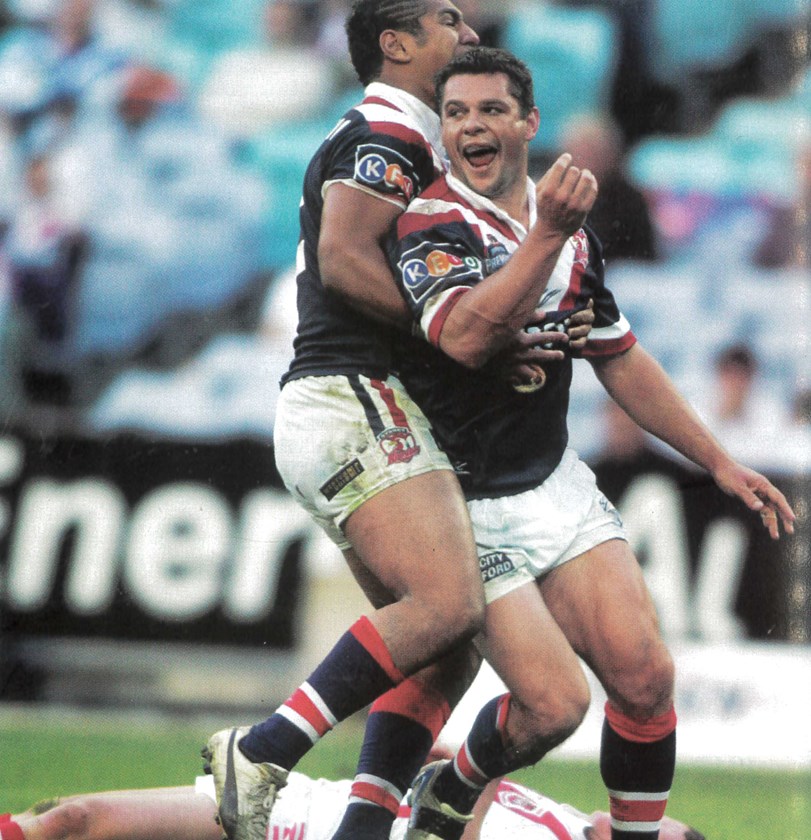 Playing for Premierships: Gavin Lester is pictured celebrating one of his three tries in the Grand Final victory in 2004. 