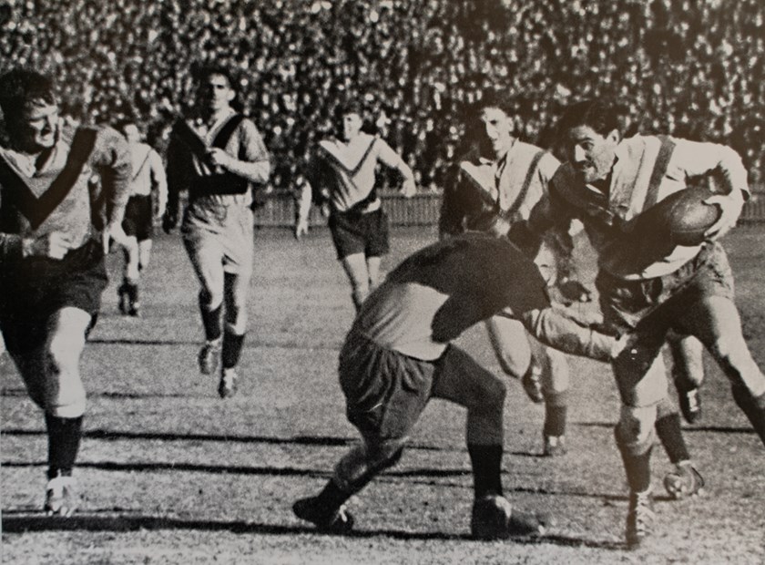 Try-Scorer: Centre Paul Tierney (pictured here with the ball in the 1945 Grand Final) was a noted try-scorer for Easts, and bagged a double in the Club's first match against Parramatta in 1947. 