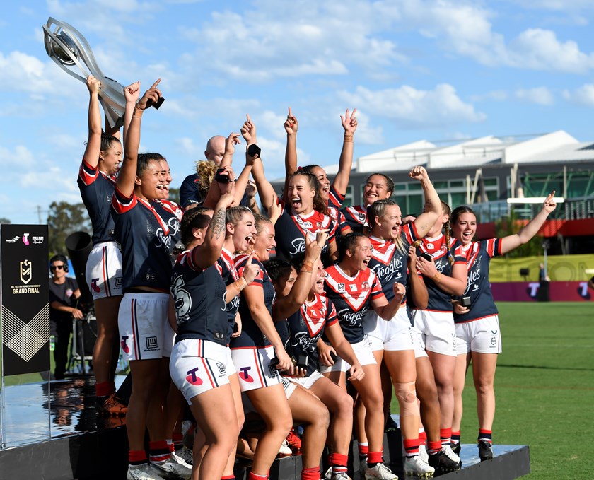 Brydie Parker celebrates the Roosters' maiden NRLW Premiership with a heavily strapped knee, doing her best to ignore her injury and soak in the moment. 