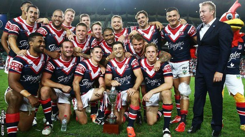 Winners are Grinners: The Sydney Roosters led by Anthony Minichiello claimed their third World Club Challenge in 2014.