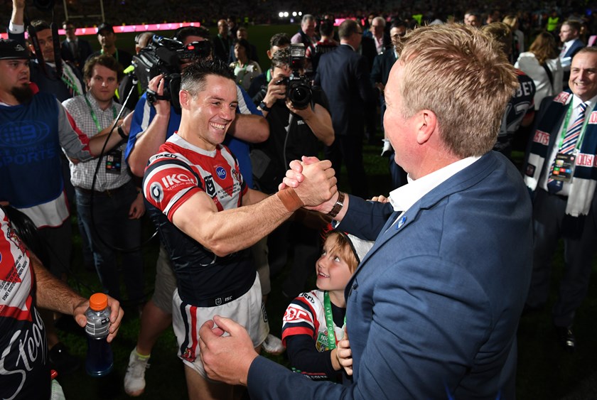 Back To Back: Robinson and Cooper Cronk share a moment following the 2019 Grand Final victory. 