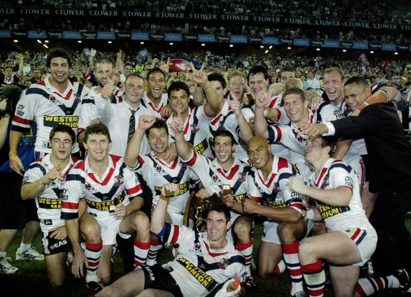 Bringing it Home: The 2002 Sydney Roosters,  led by Brad Fittler (front), broke a 27-year-long drought to bring the Premiership trophy back to Bondi.