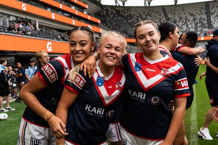 Ally Bullman (middle) celebrates the Roosters' first Tarsha Gale title with Lizzie Lomostuart and Zali Fulton last year. 