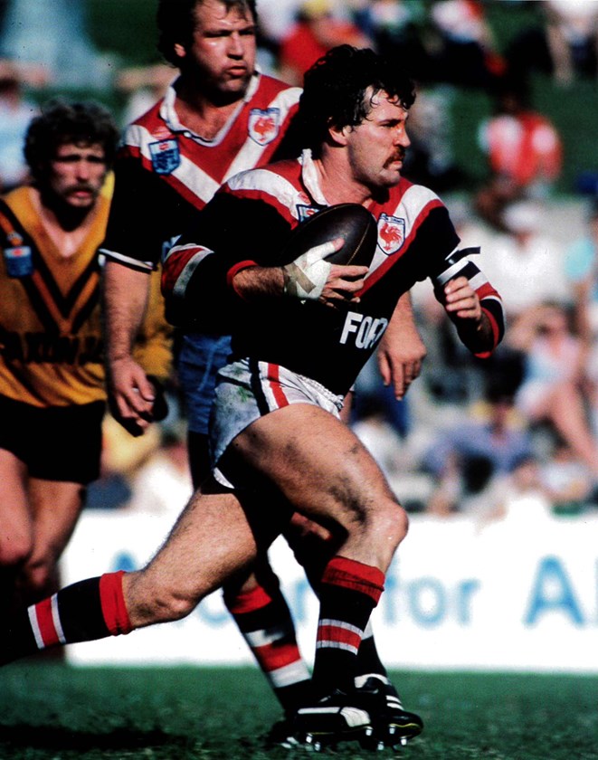 Competitive: Kevin Hastings takes the ball up against the Balmain Tigers in the mid-1980s. 