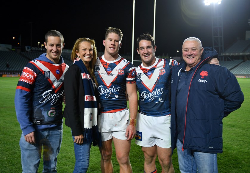 Egan Butcher and his family after making his NRL debut on the Central Coast.
