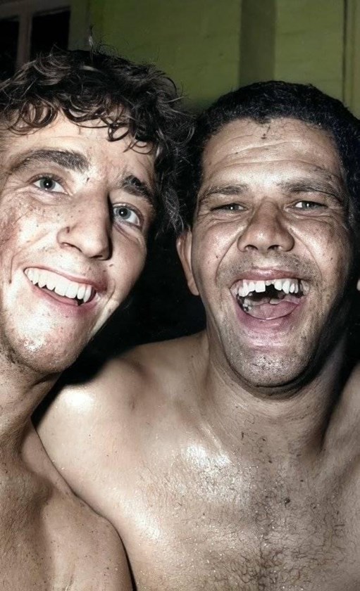 Saddler and Barry 'Bunny' Reilly smile in the sheds post-match. Image: supplied. 