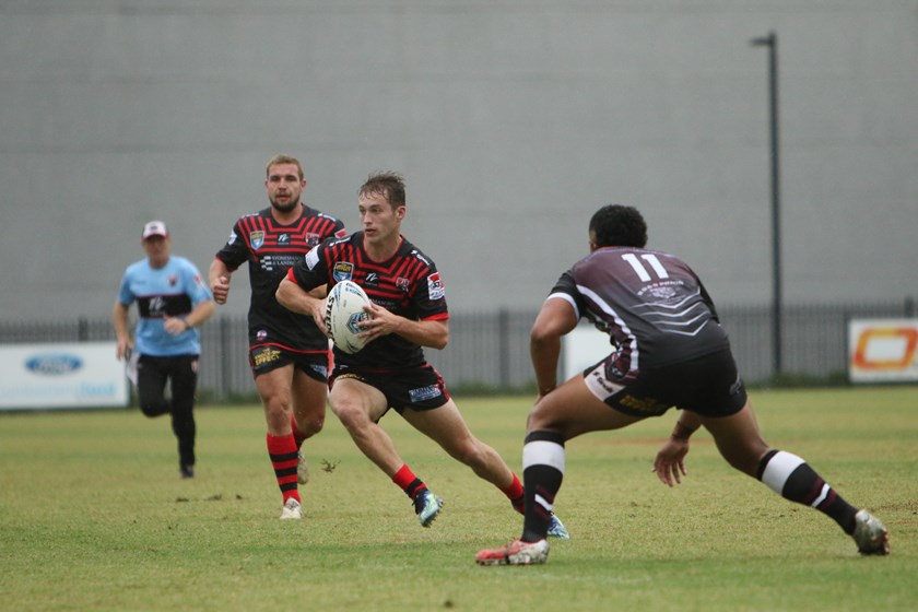 Stepping Up: Sam Walker weaves through the defence en route to setting up Naufahu Whyte for a late try. 