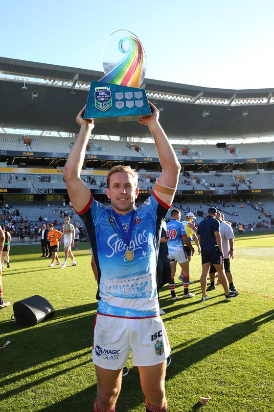 Aubusson shows the Nines trophy to the Auckland crowd.