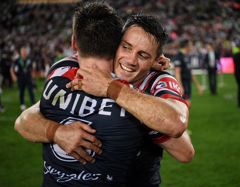 Cooper Cronk and Luke Keary on field after the 2019 NRL Grand Final.