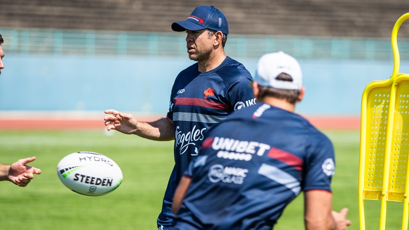Cayless imparting some wisdom to the Roosters squad.