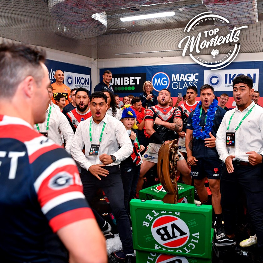 Cooper Cronk receives a haka farewell from the Kiwi members of the squad.