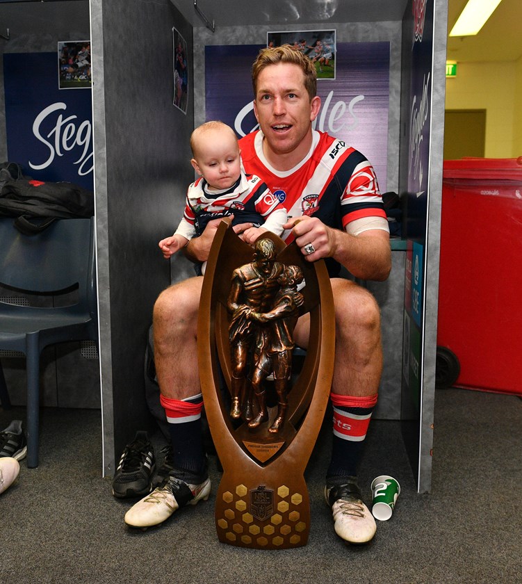 Aubusson celebrating the 2018 Premiership win with his daughter