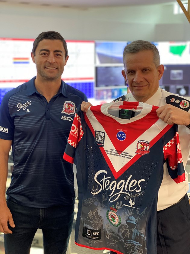 Anthony Minichiello with Commissioner Rob Rogers.