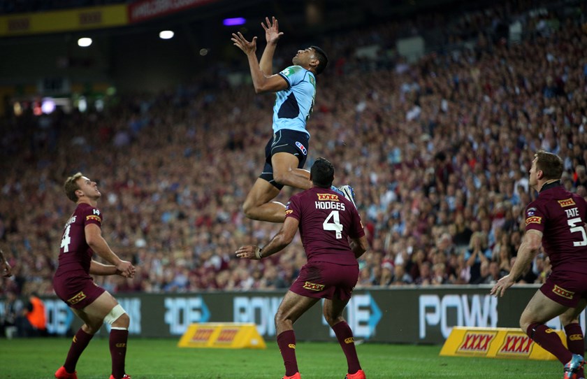 Tupou doing what he does best, flying high above the rest