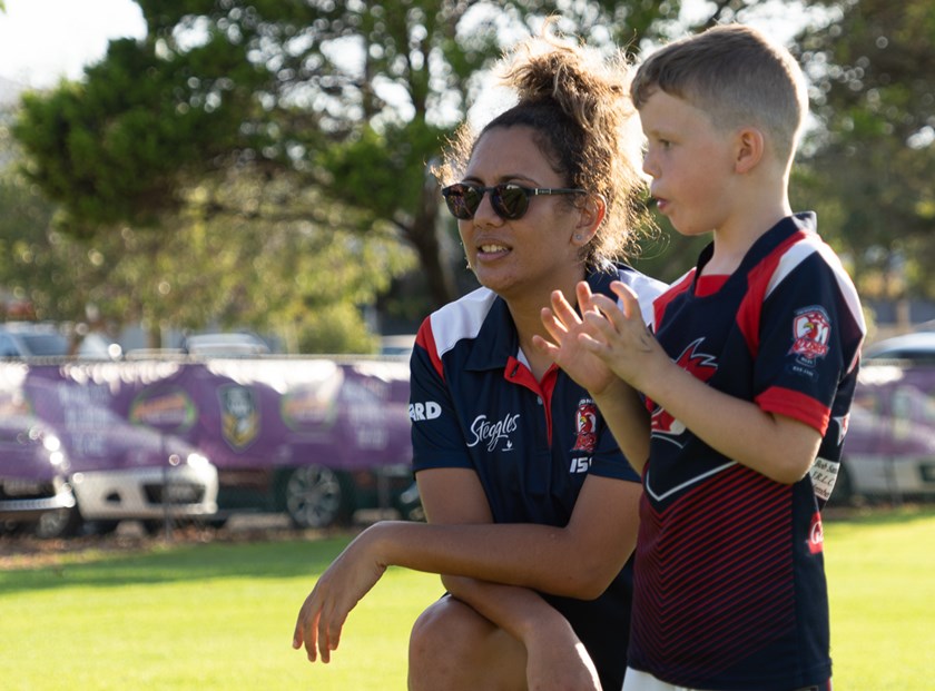 Talisha Harden running a play-the-ball drill with the kids.