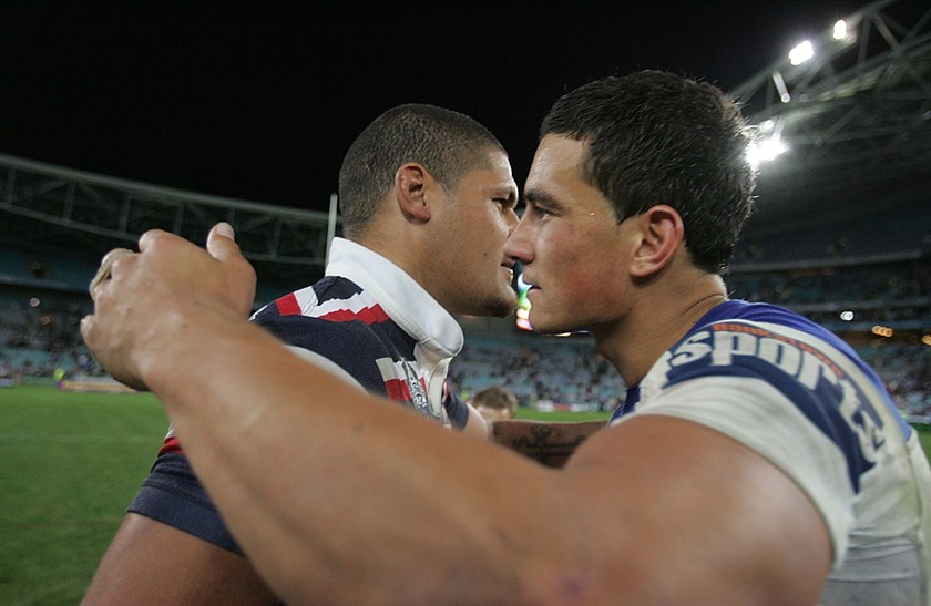 Willie Mason and Sonny Bill Williams embrace following their first meeting as opposition.