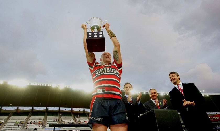 Captain Craig Fitzgibbon holds up the Anzac Cup in 2007.