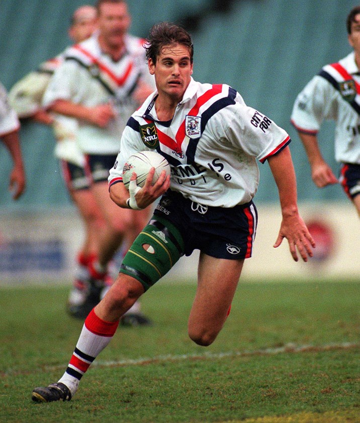 Jack Elsegood takes a hit-up for the Roosters in 2000.