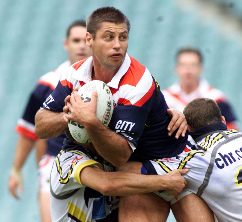 Ricketson searches for the offload against the Cowboys.