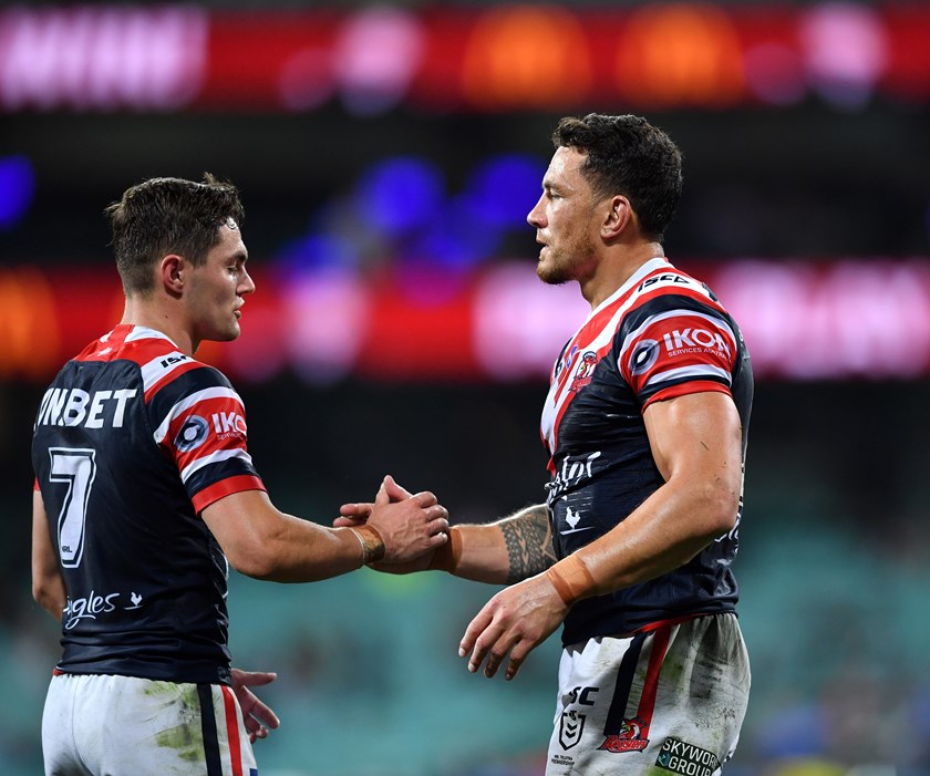 Sonny Bill Williams celebrates a victory with Kyle Flanagan.