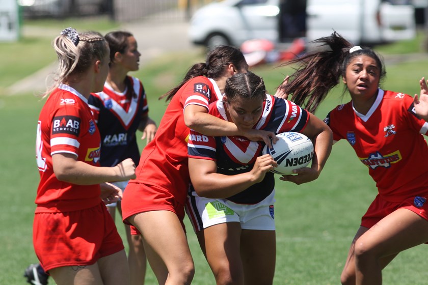Tarsha Gale: Sydney Roosters' Tarnee Evans charges through a tackle from an Illawarra player