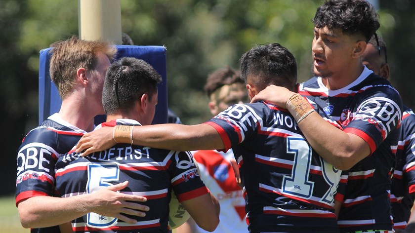 SG Ball: Kyron Fekitoe (5) is congratulated by team mates after scoring a try