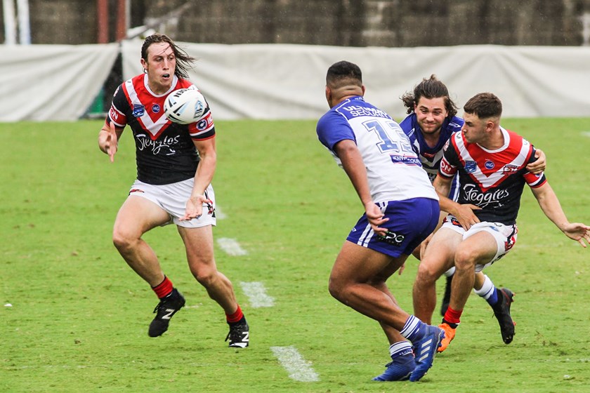Sydney Roosters' Phoenix Steinwede receives a pass from Sandon Smith.